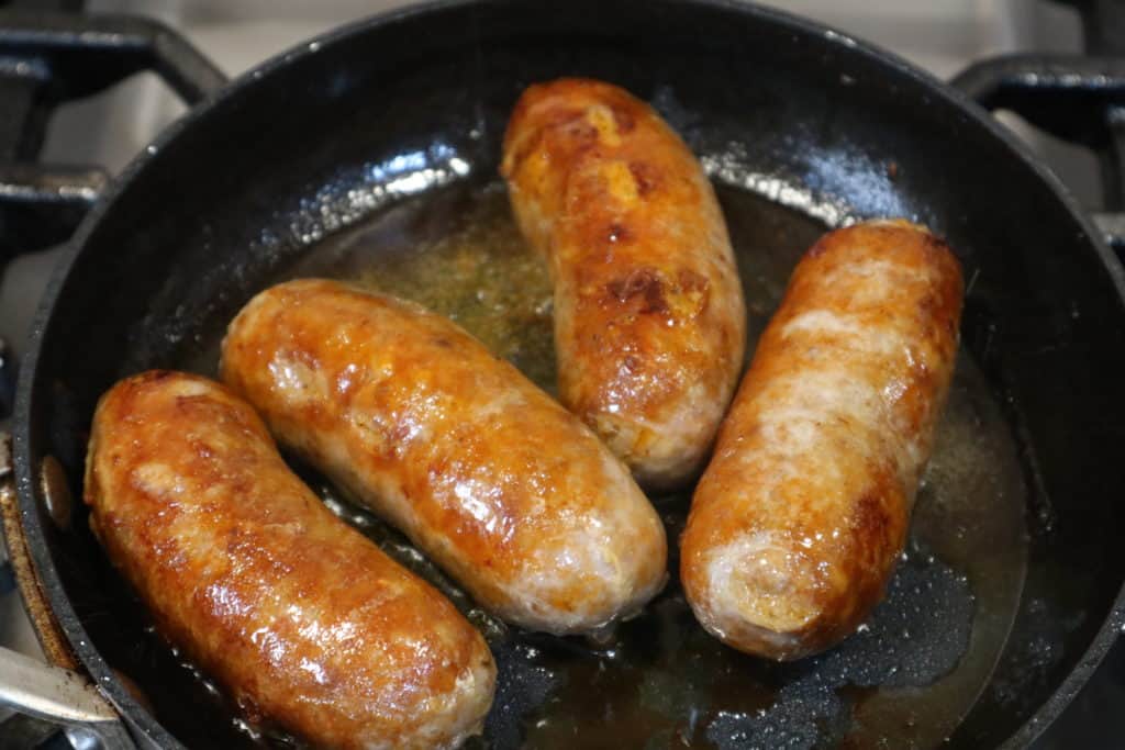 Browned Italian Sausage in fry pan